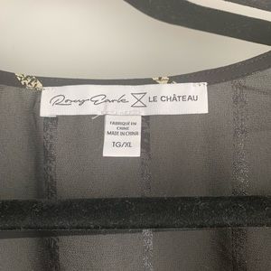 Black and Gold blouse with tie at waist.